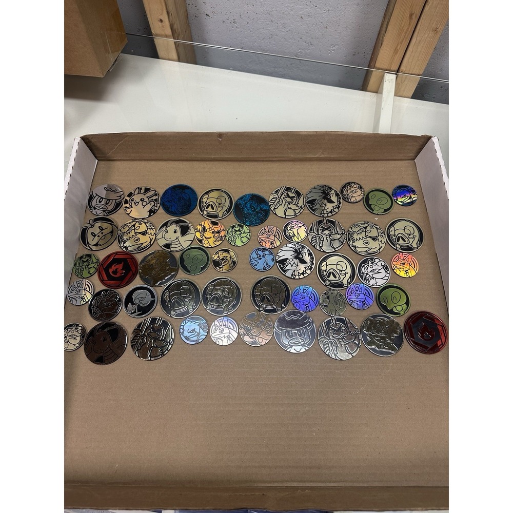 Pokémon TCG - 50 Official Coin Lot  Mixed Years & Styles, Varying‎ Condition!